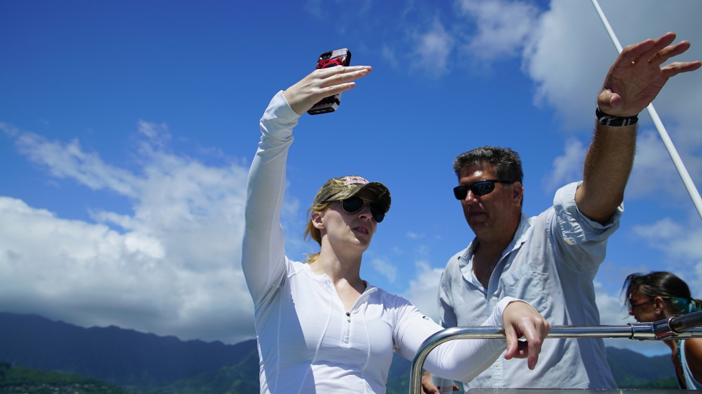 Coral Reef Airborne Laboratory (CORAL) scientists Michelle Gierach and Eric Hochberg identify reef locations for study at Kaneohe Bay on Oahu, Hawaii. Credit: NASA/James Round