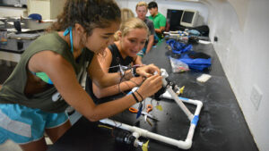 Students work together to build a remotely operated vehicle, or ROV