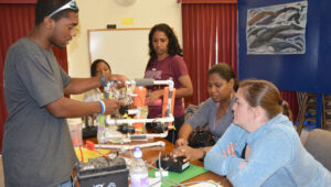 Teachers learn how to build remotely operated vehicles at an educational workshop