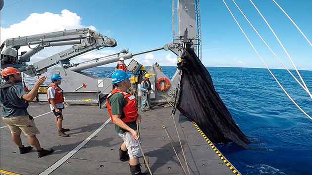 Craig Carlson oversees the deployment of the MOCNESS off the stern of the R/V Atlantic Explorer during a BIOS-SCOPE cruise